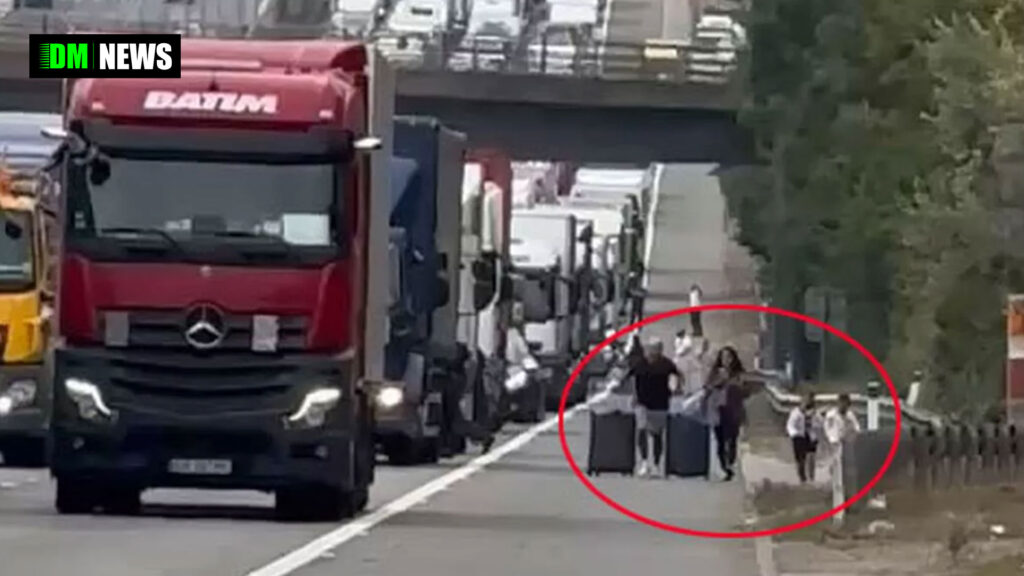 Drivers on the M1 were left stunned after spotting a couple walking along the motorway with suitcases, desperately trying to reach the airport in time for their flight.