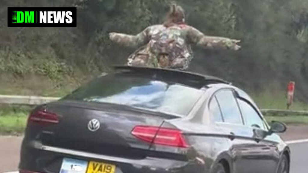 Woman Spotted Standing Through Sunroof of Private Hire Vehicle on UK Motorway