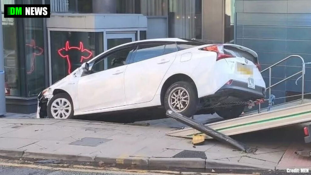 Private hire vehicle overturns outside Manchester city centre hotel