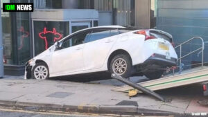 Private hire vehicle overturns outside Manchester city centre hotel